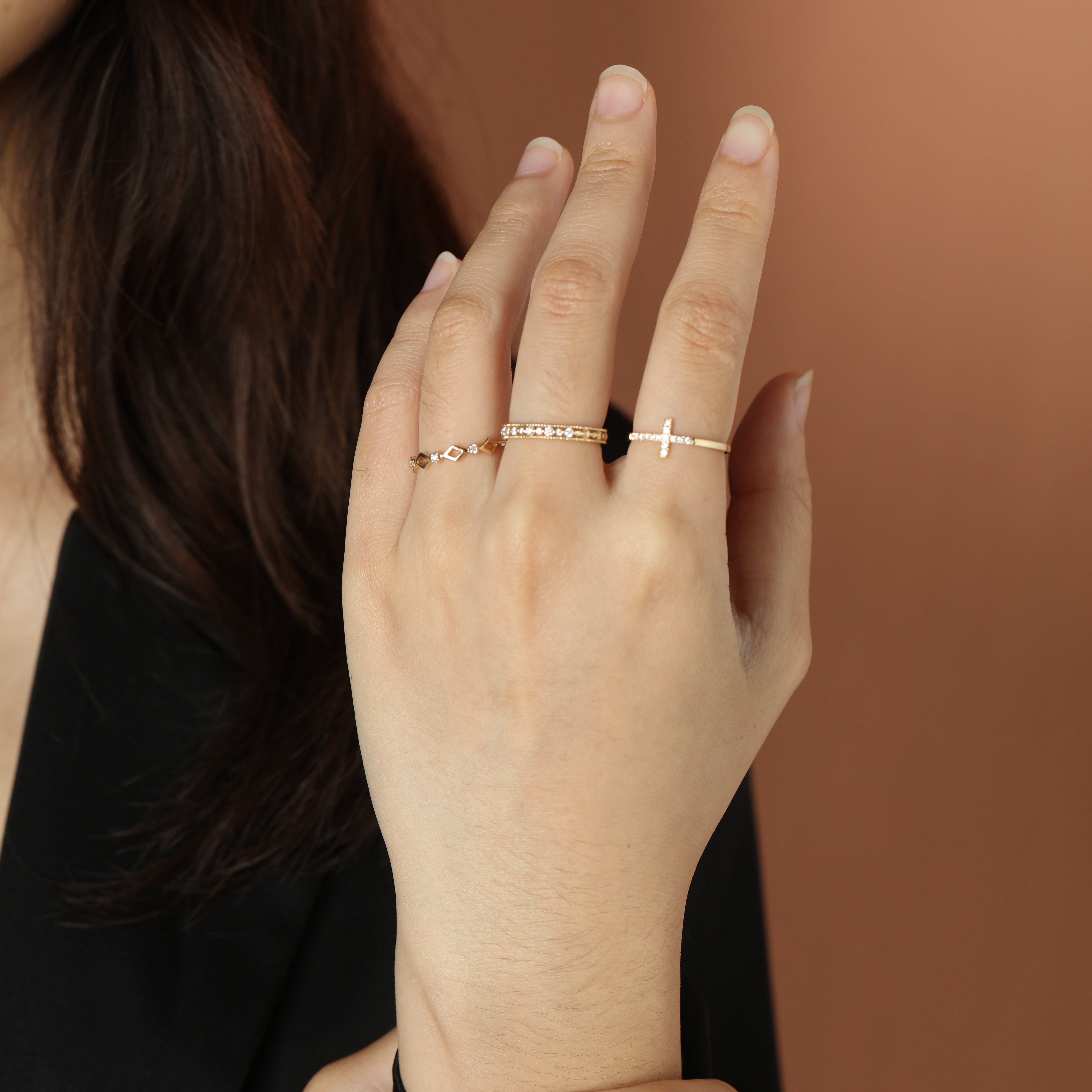 Woman wearing Frank & Label jewellery while reading