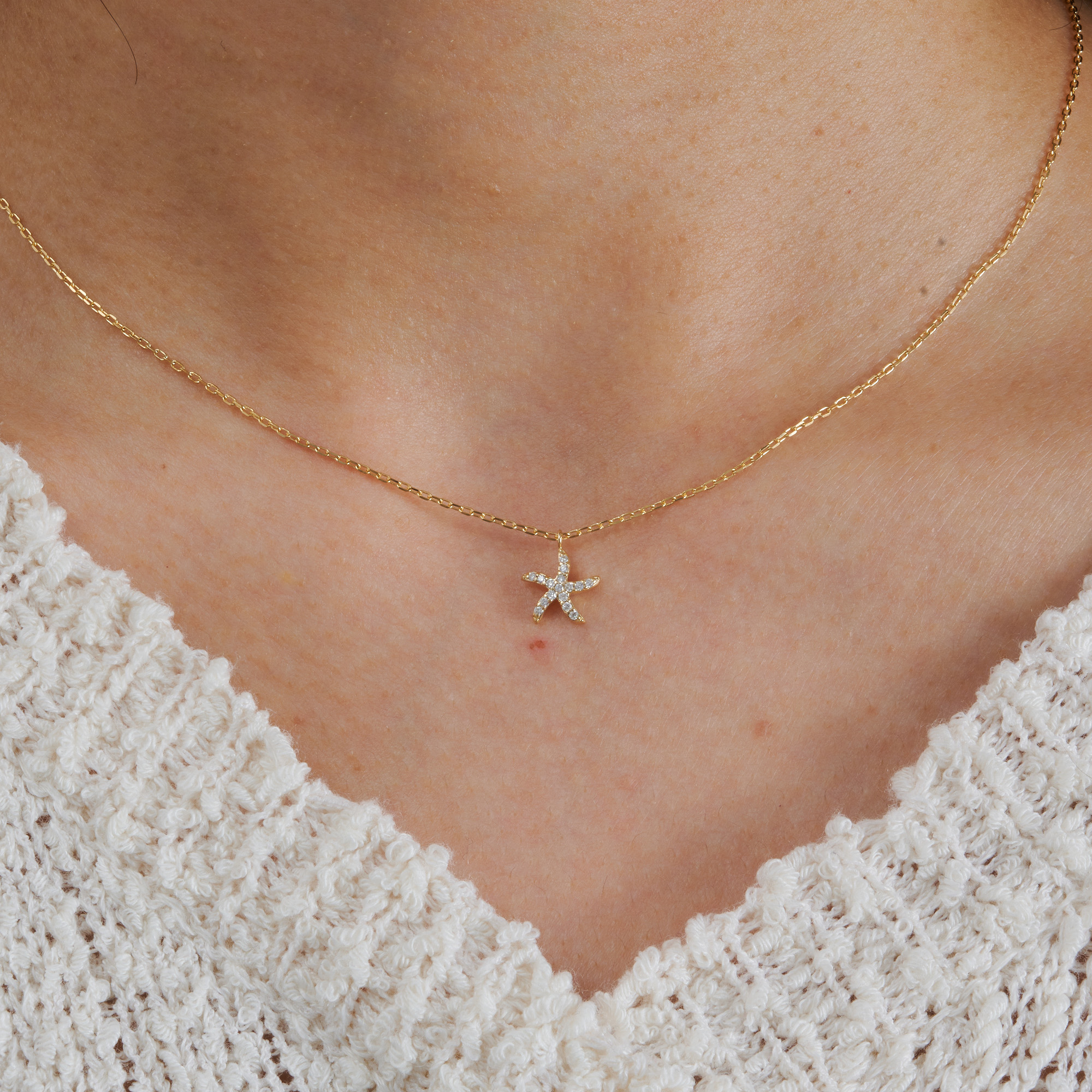 Woman wearing Frank & Label jewellery
